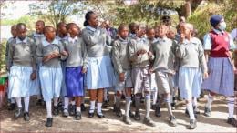 Defence CS Soipan Tuya with pupils in Narok.